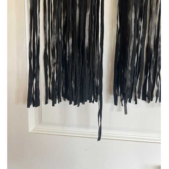 Understated Leather Leather Mini Skirt with Tassels in Black - Picture 10 of 11